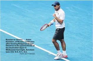  ?? PHOTO: GETTY IMAGES ?? Russian to victory . . . Aslan Karatsev, of Russia, celebrates after beating Bulgarian Grigor Dimitrov in the quarterfin­als of the Australian Open in Melbourne last night. Karatsev won 26, 64, 61, 62.