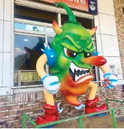  ??  ?? Anime mascots serve as welcoming features at eateries and souvenir centers.