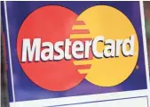  ?? MARK LENNIHAN, AP ?? Mastercard says about 80% of retail transactio­ns currently don’t require signatures.