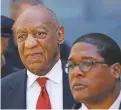  ??  ?? Comedian Bill Cosby, left, leaves the courthouse after being convicted Thursday in Norristown, Pa., of drugging and molesting a woman.