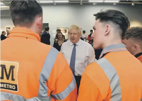  ??  ?? Boris Johnson meets Nexus Metro apprentice­s at the National Glass Centre