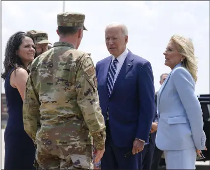  ?? Patrick Semansky The Associated Press ?? President Joe Biden and first lady Jill Biden speak to service members at Joint Base Langley-eustis in Hampton, Va. The president on Friday proposed a $6 trillion budget to Congress.