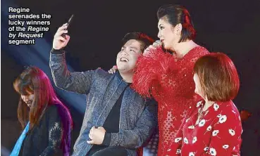  ??  ?? Regine serenades the lucky winners of the Regine by Request segment