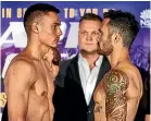  ??  ?? Tim Tszyu, left, and Bowyn Morgan square off at the weigh-in.