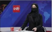  ?? EBRAHIM NOROOZI — THE ASSOCIATED PRESS ?? Khatereh Ahmadi, a TV anchor, wears a face covering as she reads the news on TOLO NEWS, in Kabul, Afghanista­n, Sunday.