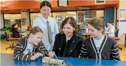  ??  ?? Principal Dr Lyn Bird (centre) with some of the students from Selwyn House School.