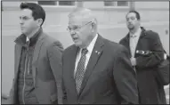  ?? AP/SETH WENIG ?? U.S. Sen. Bob Menendez, D-N.J., leaves the federal courthouse in Newark on Monday.