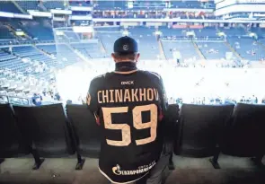  ?? PHOTOS BY ADAM CAIRNS/COLUMBUS DISPATCH ?? Jason “Jas” Chaffin wears the Russian KHL club Avangard Omsk jersey of Blue Jackets right winger Yegor Chinakhov. Some say his jersey collection, which has not been easy for him to put together, is more impressive than his knowledge.