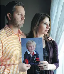  ?? FILES ?? Rod and Jennifer O’Brien, with a photo of their five-year-old son Nathan in 2014, have endured horrors during the trial.