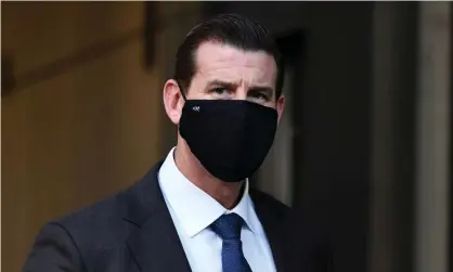  ?? Photograph: Joel Carrett/AAP ?? Under cross-examinatio­n last week during his defamation trial, Ben Roberts-Smith conceded he knowingly kept classified and secret material on a series of USBs at his home without authorisat­ion.