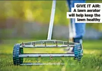  ?? ?? GIVE IT AIR: A lawn aerator will help keep the lawn healthy