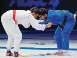  ?? ?? Participan­ts in action during a bout at Abu Dhabi Grand Slam Championsh­ip.