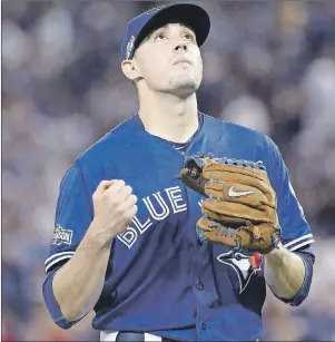  ?? CP PHOTO ?? Toronto Blue Jays starting pitcher Aaron Sanchez reacts after pitching against the Cleveland Indians in Game 4 of the American League Championsh­ip Series in Toronto in October 2016.