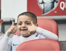  ??  ?? Bradley gives the thumbs-up before the game and during his time on the pitch.