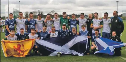  ??  ?? Scotland and their Irish opponents after the recent under 21 shinty/hurling internatio­nal held at the GAA National Games Developmen­t Centre in Dublin.