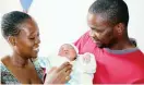  ??  ?? Mr Admore Jecheche and wife Thandiwe Ncube hold their newly-born baby Admore Junior who was one of the New Year babies at Mpilo Central Hospital.(Picture by Eliah Saushoma)