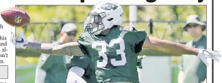  ?? Bill Kostroun ?? DYNAMIC DUO: Jamal Adams stretches to grab a pass Sunday. Todd Bowles says he is happy with Adams’ and Marcus Maye’s skill levels.