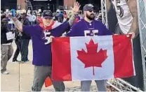  ?? ADAM GORDON ?? Adam Gordon, right, who lives in Windsor, Ontario, waits with his friend Ben Beebe outside M&amp;T Bank Stadium before a Ravens game. Gordon has come to a game every year since 2013 and started the Facebook group Ravens Nation North to interact with fans.