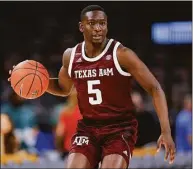  ?? Michael Hickey / Getty Images ?? Hassan Diarra transferre­d to UConn after spending the past two seasons at Texas A&M.
