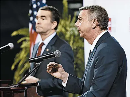  ?? STEVE HELBER/AP ?? GOP gubernator­ial candidate Ed Gillespie, right, debates Democrat Ralph Northam earlier this month in Wise, Va.