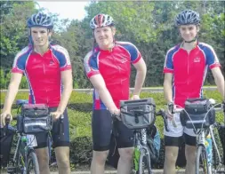  ??  ?? Alistair Gethin, centre, and friends Cosmo Cotton and Alex Milne prepare for their cycle ride to Bilbao
