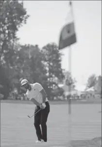  ?? ASSOCIATED PRESS FILE PHOTO ?? Dustin Johnson hits to the third green during the second round of the BMW Championsh­ip last Friday in Lake Forest, Ill.