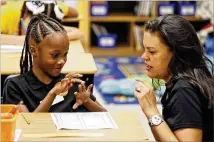  ?? CONTRIBUTE­D ?? Many Atlanta Public Schools students come from poor families and arrive with social disadvanta­ges and learning deficits that can be overcome but require smaller class sizes, longer days and targeted help — all of which cost money.