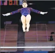  ??  ?? SUNISA LEE, competing on the uneven bars, qualified for the all-around final along with Simone Biles.