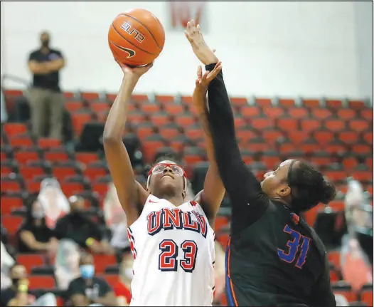  ?? STEVE MARCUS ?? UNLV forward Desi-rae Young (23) goes up for a shot against Boise State forward Elodie Lalotte (31) during a Feb. 10 game at Cox Pavilion. Young, who was not heavily recruited out of high school, was the Lady Rebels’ most valuable player in 2020-21, leading the team in scoring, rebounds and field goal percentage on the way to being named the Mountain West Freshman of the Year.