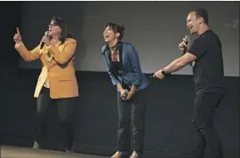  ?? Jason Armond Los Angeles Times ?? XOCHITL GOMEZ, center, who stars as America Chavez in “Doctor Strange in the Multiverse of Madness,” speaks Thursday at the El Capitan Theatre premiere.