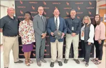  ?? Keith Deal ?? Administra­tion members from LaFayette High School and Walker County Schools were on hand this past Wednesday to officially welcome and introduce Andy Scott as the 37th head football coach in Rambler program history.