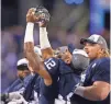  ?? AARON DOSTER, USA TODAY SPORTS ?? Penn State’s Chris Godwin holds up the Big Ten championsh­ip trophy.