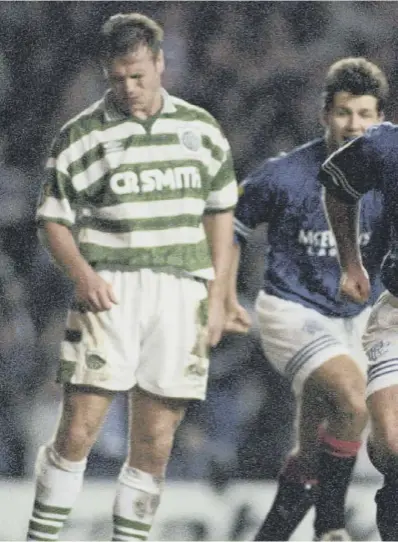  ??  ?? 0 Ally Mccoist celebrates scoring Rangers’ second goal in the epic 3-3 draw against Celtic at Ibrox on 19 November, 1995. Many observers say it’s the finest ever Old Firm fixture