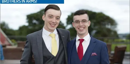  ??  ?? Twins Troy and Levi Jackson attend the Grange Post Primary School Graduation last Tuesday night at the Radisson.