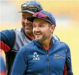  ??  ?? England head coach Trevor Bayliss, left, isn’t a fan of internatio­nal Twenty20 cricket but plenty of others are, including New Zealand coach Mike Hesson, right.