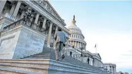  ?? ALEX EDELMAN/CNP 2018 ?? The Congressio­nal Budget Office projects higher deficits for this year and the coming decade. The government is on pace to spend $4.6 trillion this year. Above, the Capitol.