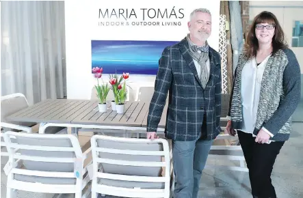  ?? GAVIN YOUNG/ CALGARY HERALD ?? Julian Riley and Klari Fekete opened a new outdoor living Maria Tomas showroom near Chinook Centre last week.
