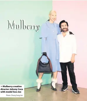  ?? Photo: Chung Sung-Jun ?? Mulberry creative director Johnny Coca with model Soo Joo