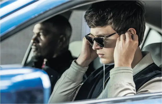  ?? WILSON WEBB/ SONY/ TRISTAR PICTURES VIA THE ASSOCIATED PRESS ?? Jamie Foxx, left, and Ansel Elgort in Baby Driver, which has its violent moments, writes Chris Knight, along with some of sweet serendipit­y.