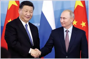  ??  ?? DANGER ZONE: China’s leader Xi Jinping and Russia’s Vladimir Putin, are on Britain’s radar