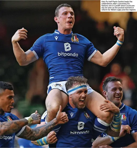  ?? ?? Italy fly-half Paolo Garbisi leads the celebratio­ns after a stunning Six Nations win in Cardiff which could one day be seen as the pivotal moment in reform for Welsh rugby and the regions
