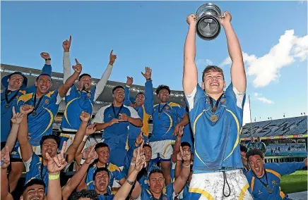  ?? GETTY IMAGES ?? Niko Jones and his St Peter’s College team-mates celebrate winning the Auckland 1A title earlier this year.