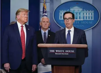  ??  ?? US Secretary of the Treasury Steve Mnuchin speaks during a press conference on the COVID-19, coronaviru­s, outbreak as Trump and US vice-president Mike Pence look on at the White House in Washington, DC.