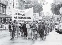  ??  ?? Taking it to the street . . . The Otago branch of the PSA marched in 1987 against the introducti­on of the State Sector Bill.