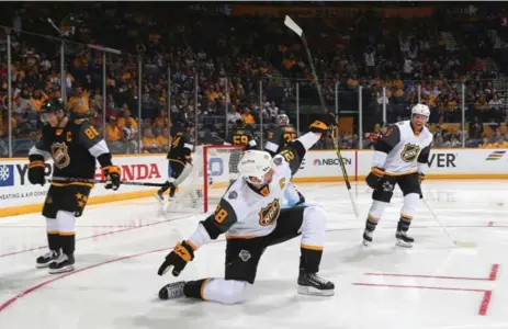  ?? BRUCE BENNETT/GETTY IMAGES ?? John Scott has some fun in celebratin­g a goal at Sunday’s all-star game in Nashville. Scott was the feel-good story of the event, copping MVP honours.