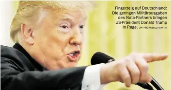  ?? DPA-ARCHIVBILD: MARTIN ?? Fing:rz:ig auf D:utschland: Di: g:ring:n Militäraus­gab:n d:s Nato-Partn:rs bring:n US-Präsid:nt Donald Trump in Rag:.