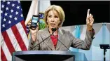  ?? HYOSUB SHIN/ HSHIN@AJC.COM ?? U.S. Education Secretary Betsy DeVos, at the Georgia World Congress Center on Tuesday, promoted a student debt app.