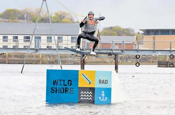  ??  ?? REBRANDING: Waterboard­er Fraser Cameron was there to promote the expansion of newly-named Wild Shore Dundee. Picture by Gareth Jennings.