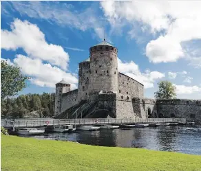  ?? PHOTOS: FOTOLIA ?? Olavinlinn­a, a castle built in 1475, sets a dramatic scene for the Savonlinna Opera Festival held every summer in Finland.