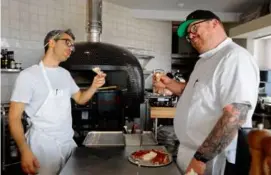  ?? ?? Top right: Chef Kevin O’Donnell (left) and executive chef Kyle Stamps try burrata on the R.I. Party Pie.